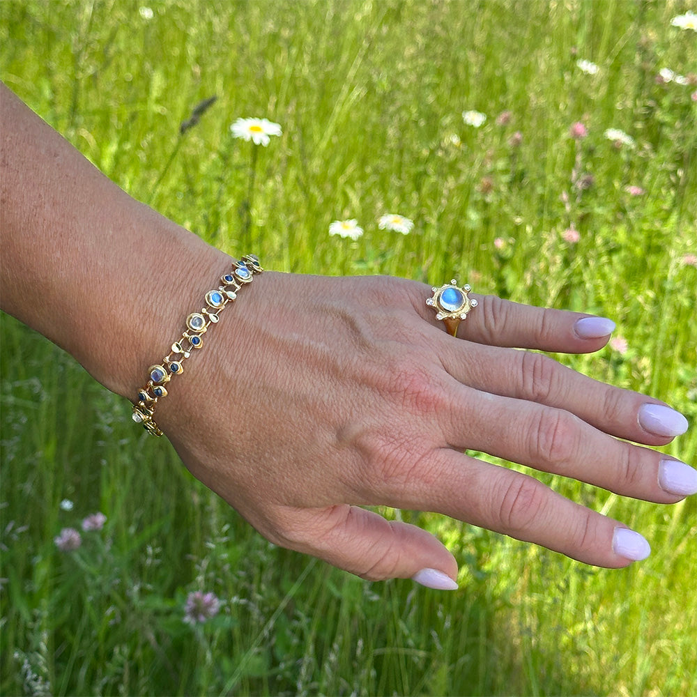 "Embrace" Ring with Moonstone and Diamonds