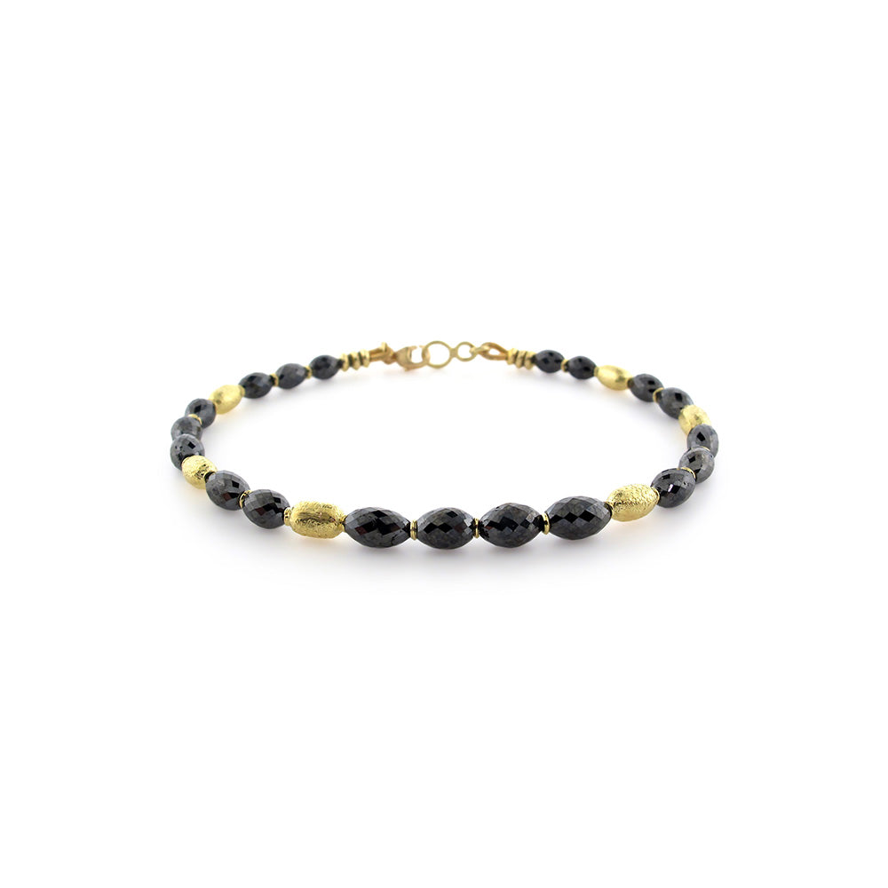 oval black diamond and rice spacer bead bracelet