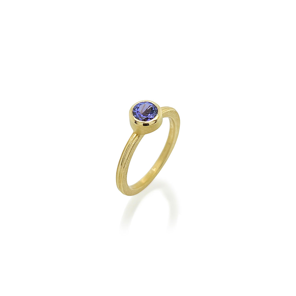 round tanzanite ring
