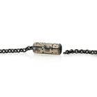 Vario spring style clasp with oxidized sterling silver, 12k yellow gold, and white (G) diamonds vsi, 0.23 cttw. Clasp is to be used with Vario style chains or strands, and is 1.1" long with a diameter of 0.4".