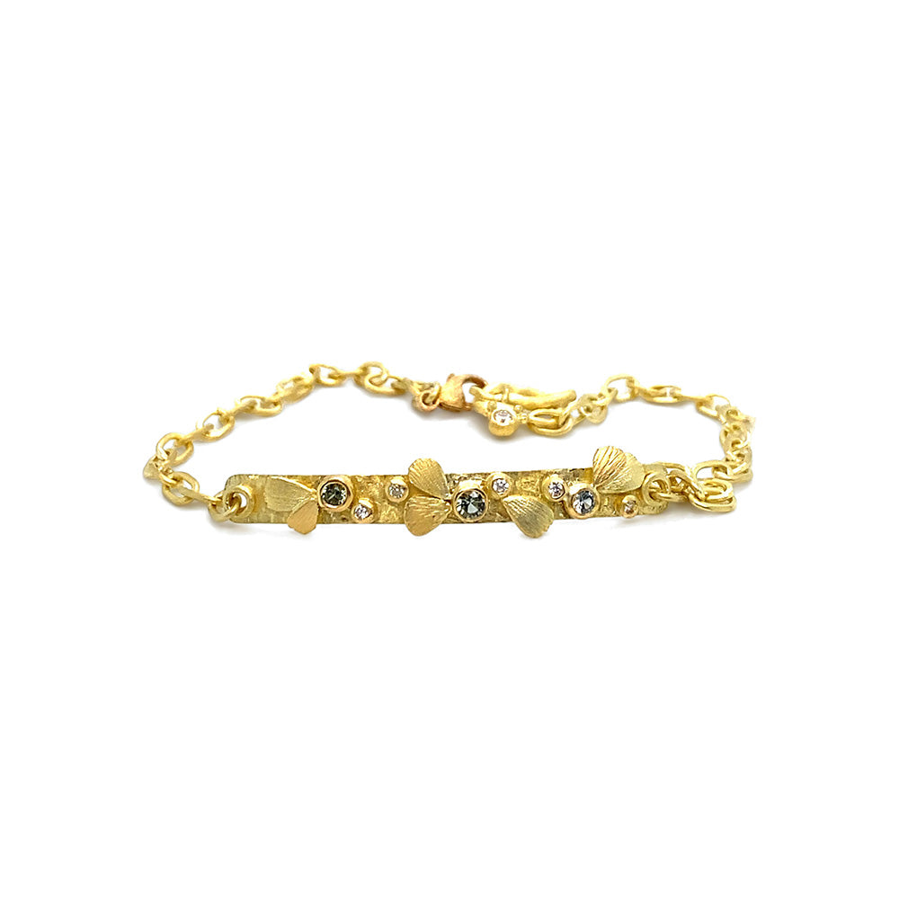 Bar Bracelet with flower petals, green spinel and diamonds