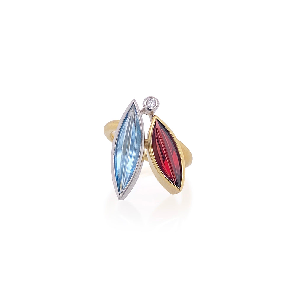 "erotik" ring in aquamarine and spessartite garnet