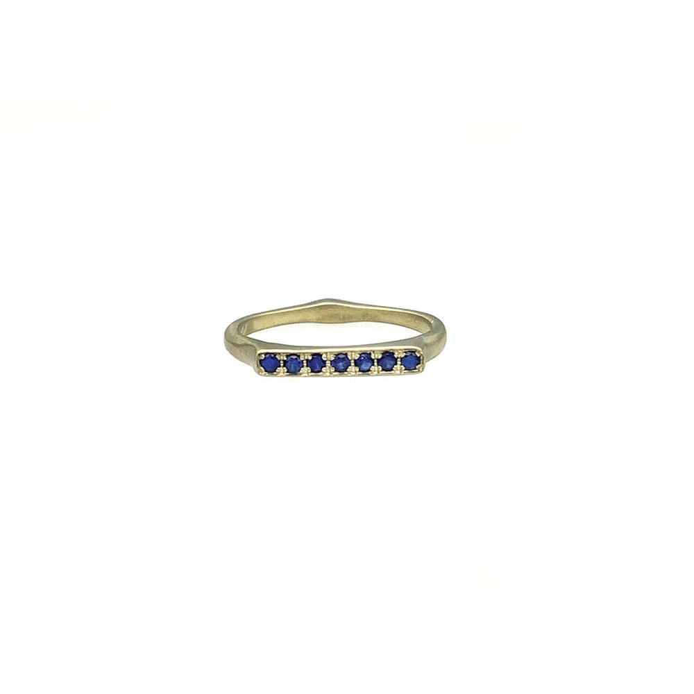 Corazon stacking ring with blue sapphires set in 18k Fairmined green gold