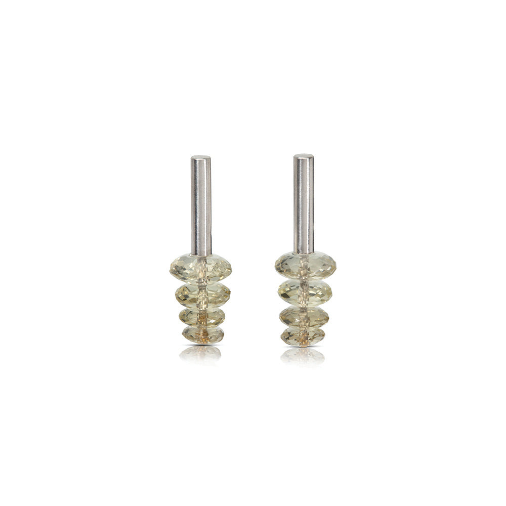 Sterling silver vertical tube earrings with post backs and rose-cut citrine beads with a 24k yellow gold rivet at the base.