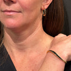 medium gold hoop earrings with black diamonds