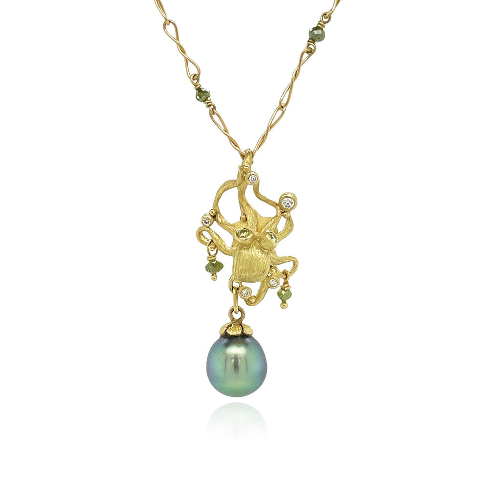 octopus pendant in 18k with Tahitian pearl and green and white diamonds